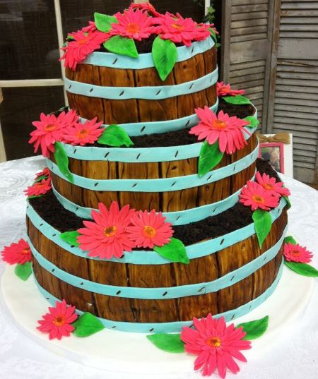 stacked wooden basket daisy cake
